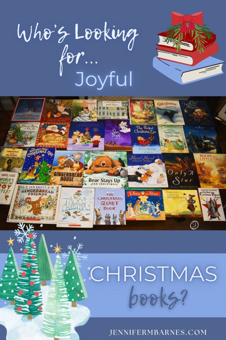 A picture full of my favorite Christmas books for children, all lined across a table